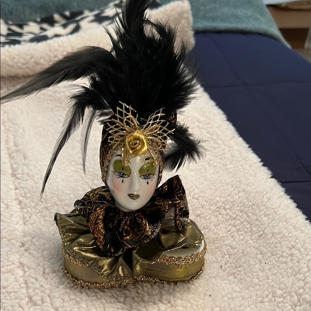 Elegant Gold and Black Decorative Doll